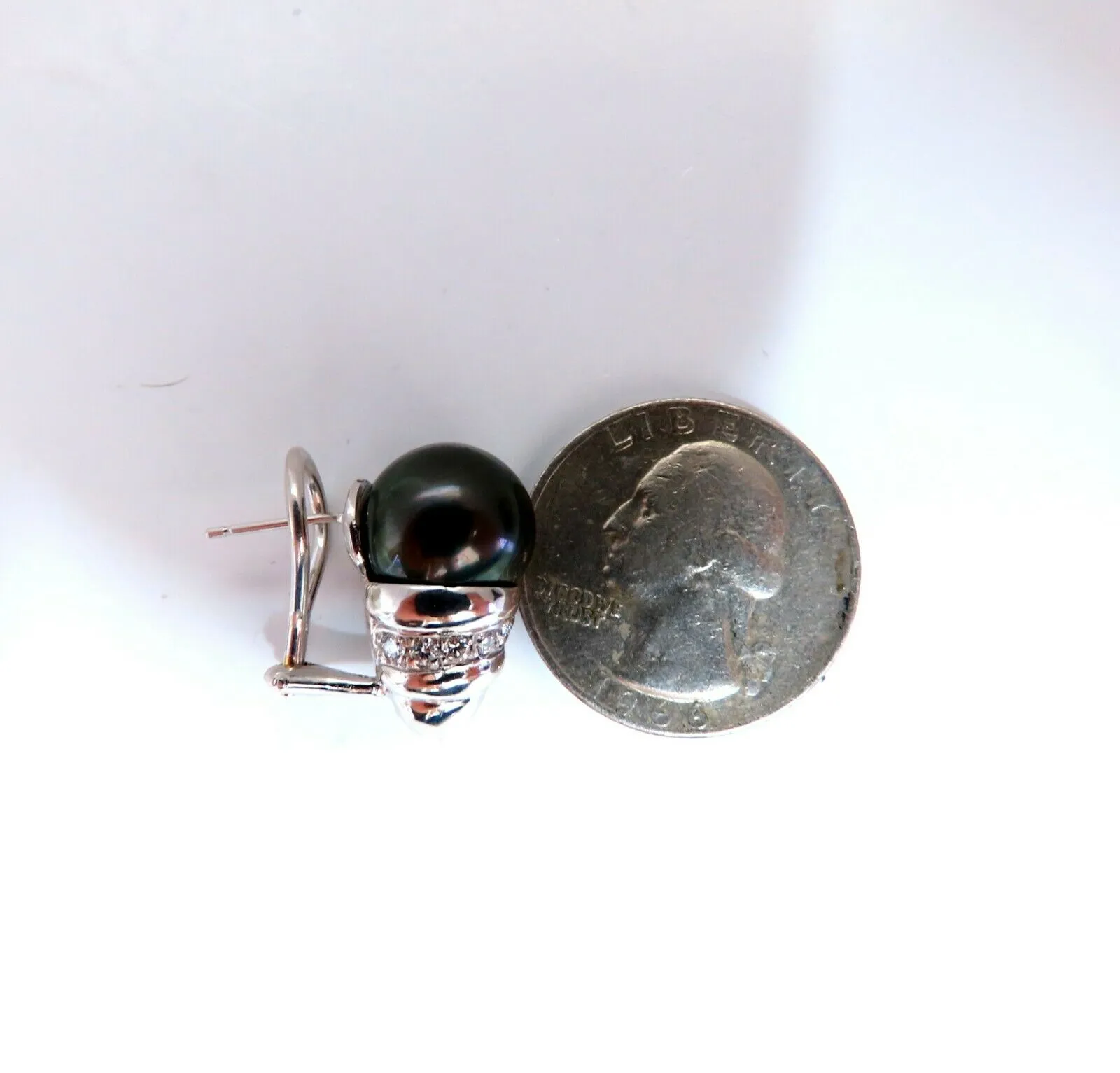11mm natural tahitian pearl & .50ct diamonds raised cap earrings 14kt