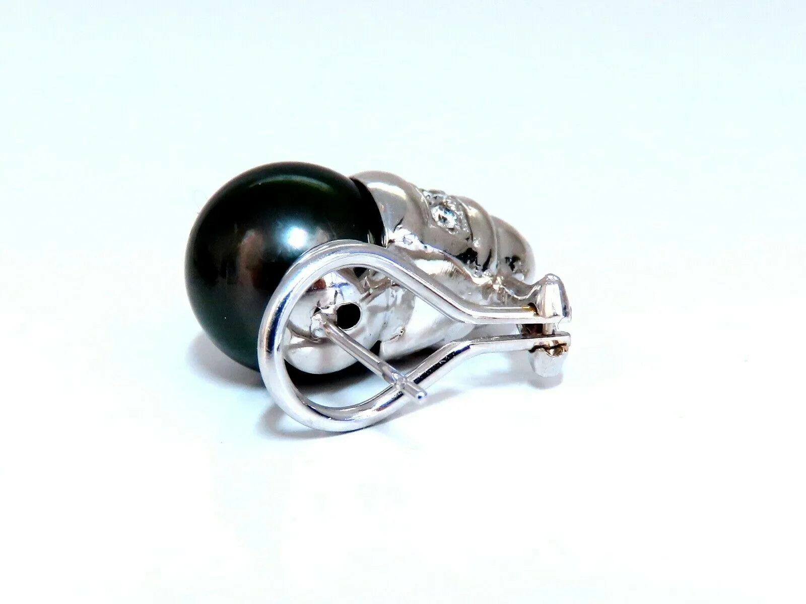 11mm natural tahitian pearl & .50ct diamonds raised cap earrings 14kt
