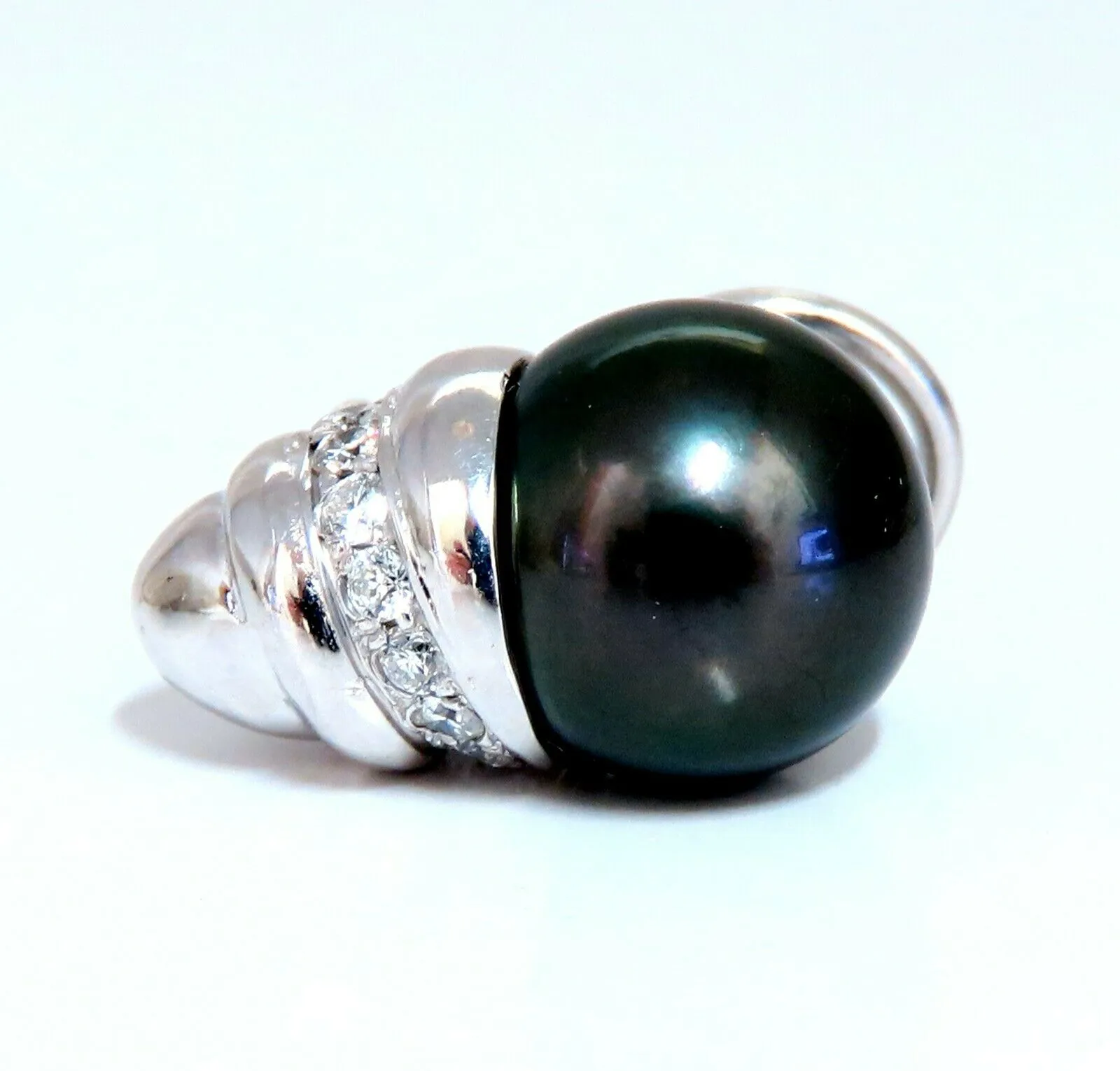 11mm natural tahitian pearl & .50ct diamonds raised cap earrings 14kt