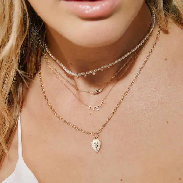 14K graduated baguette diamond curved bar necklace