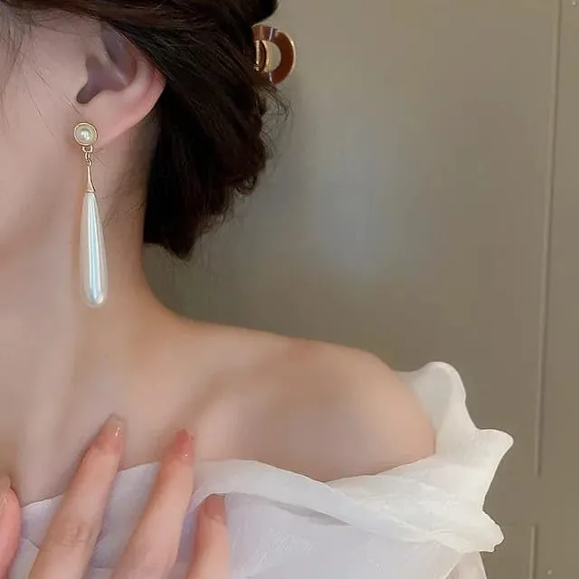 Combo Of Attractive and Stylish Water Drop Long Pearl Earrings Danglers and Butterfly Earrings Purple Crystal Rhinestone Drop Butterfly Stud Earrings for Girls Korean Earrings Pack of 2 Earrings Set