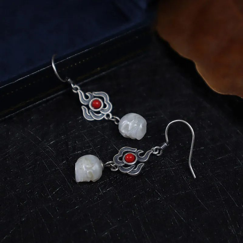 Flame-shaped Pearl Skull Earrings