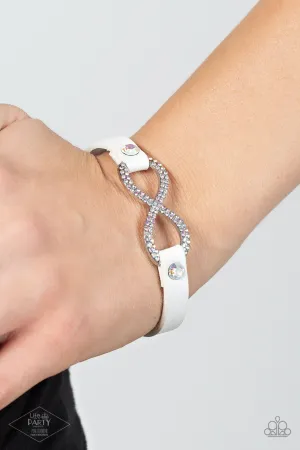 Innocent Till Proven GLITZY - Multi - Iridescent Rhinestone Infinity White Leather Paparazzi Wrap Bracelet - Pink Diamond Exclusive