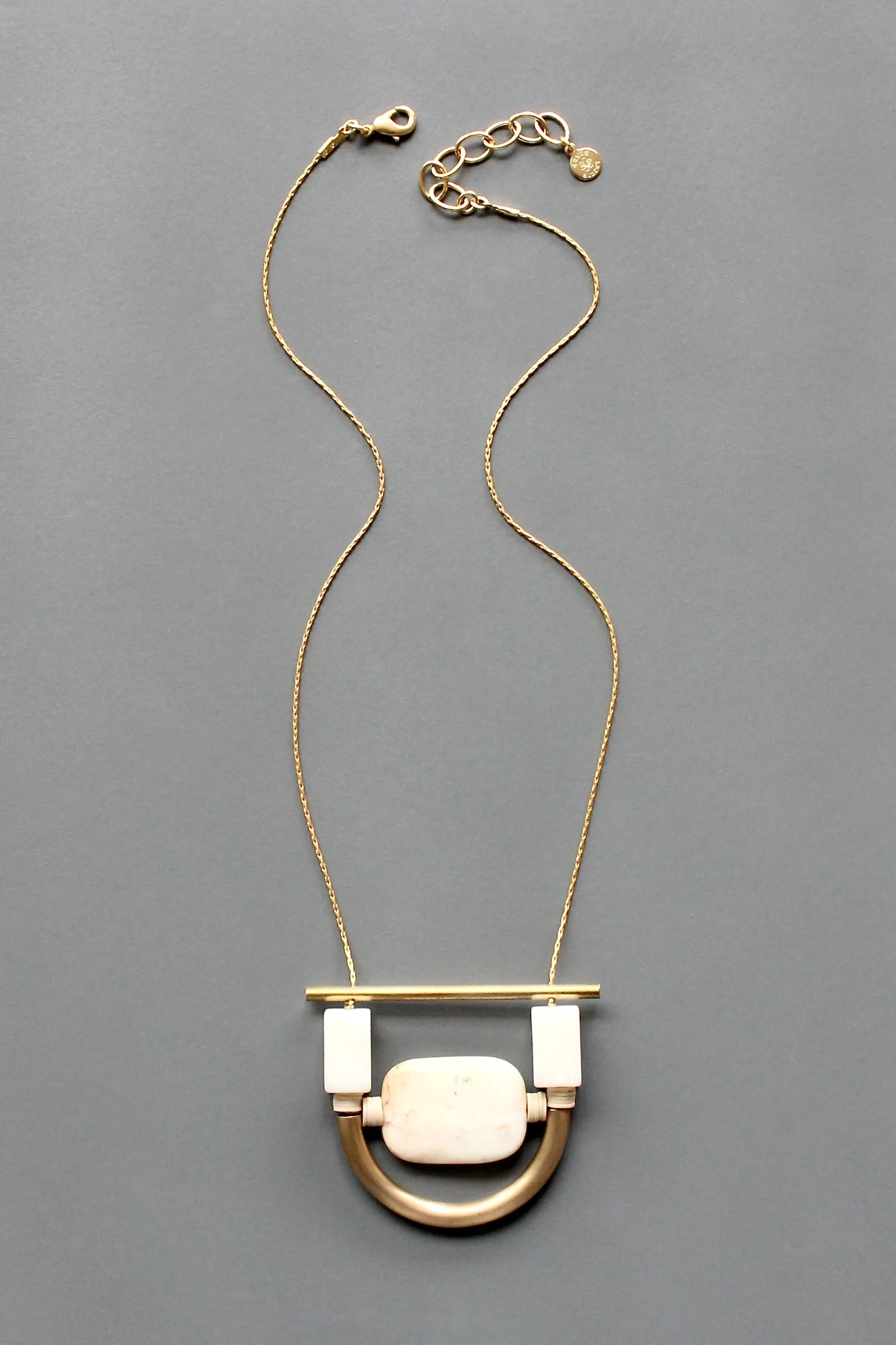 ISL117 White stone and brass geometric necklace