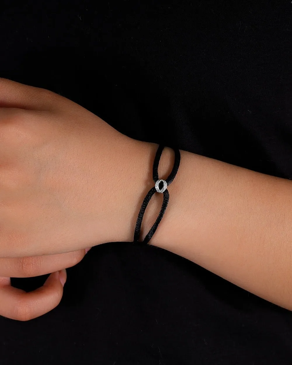 MOISSANITE ICED INFINITY CORD BRACELET.