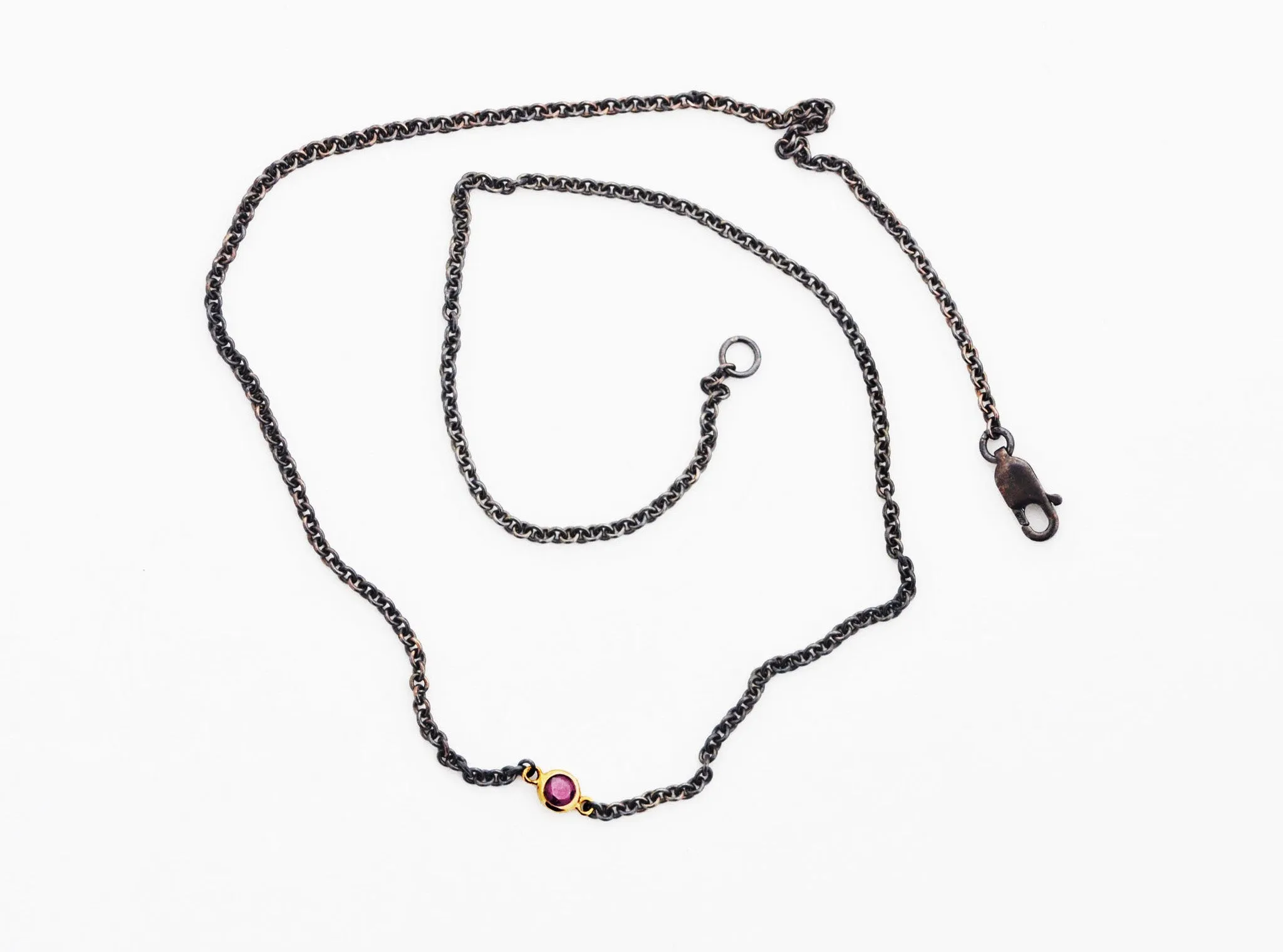 necklace / silver   small gemstone in gold bezel