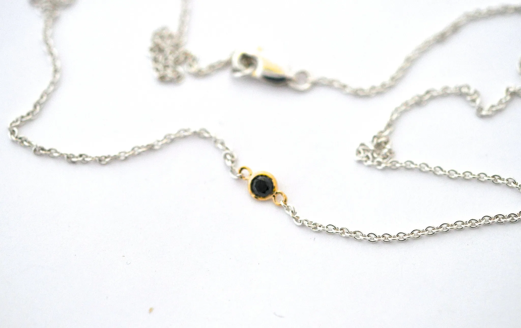 necklace / silver   small gemstone in gold bezel
