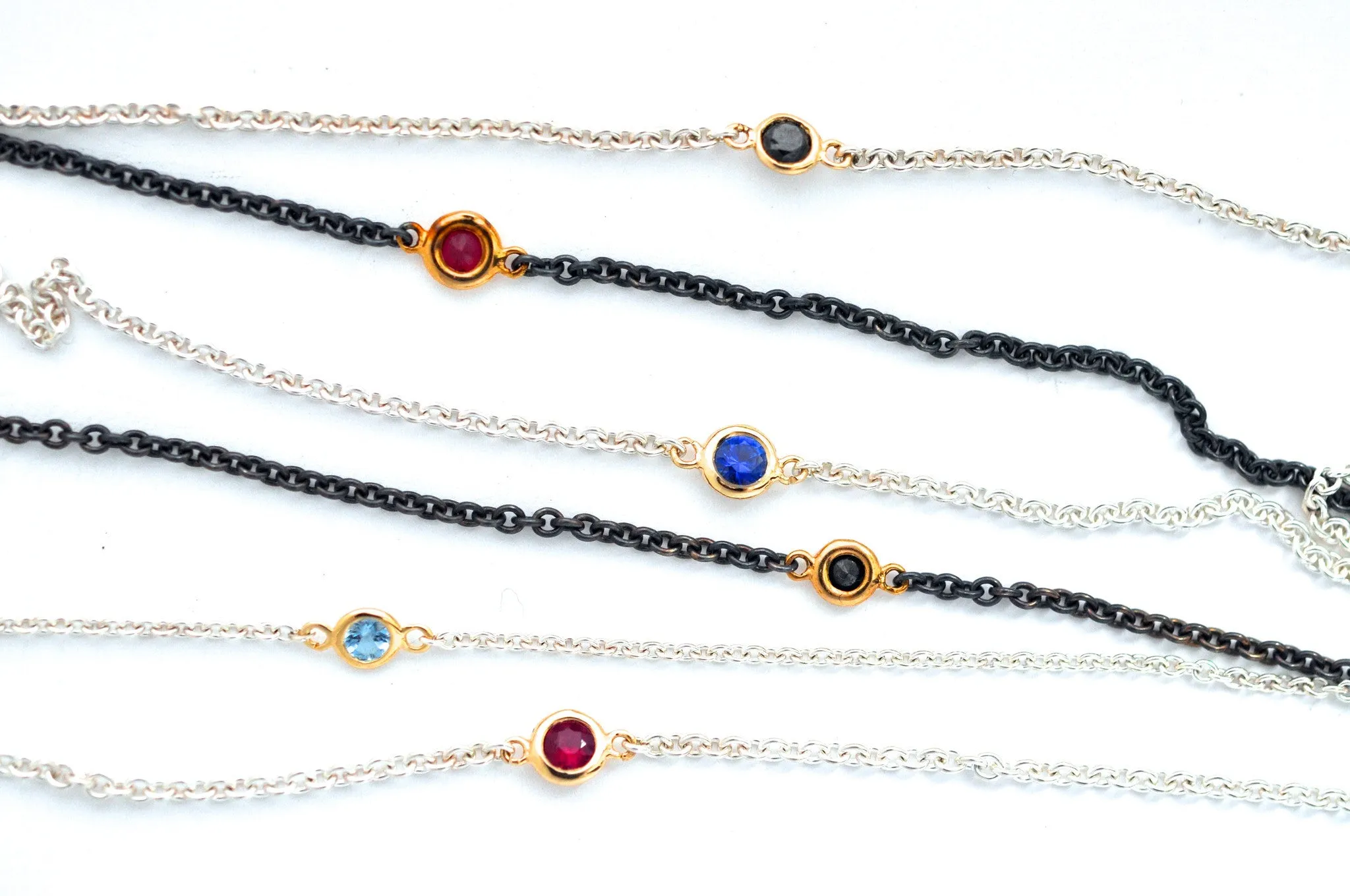 necklace / silver   small gemstone in gold bezel