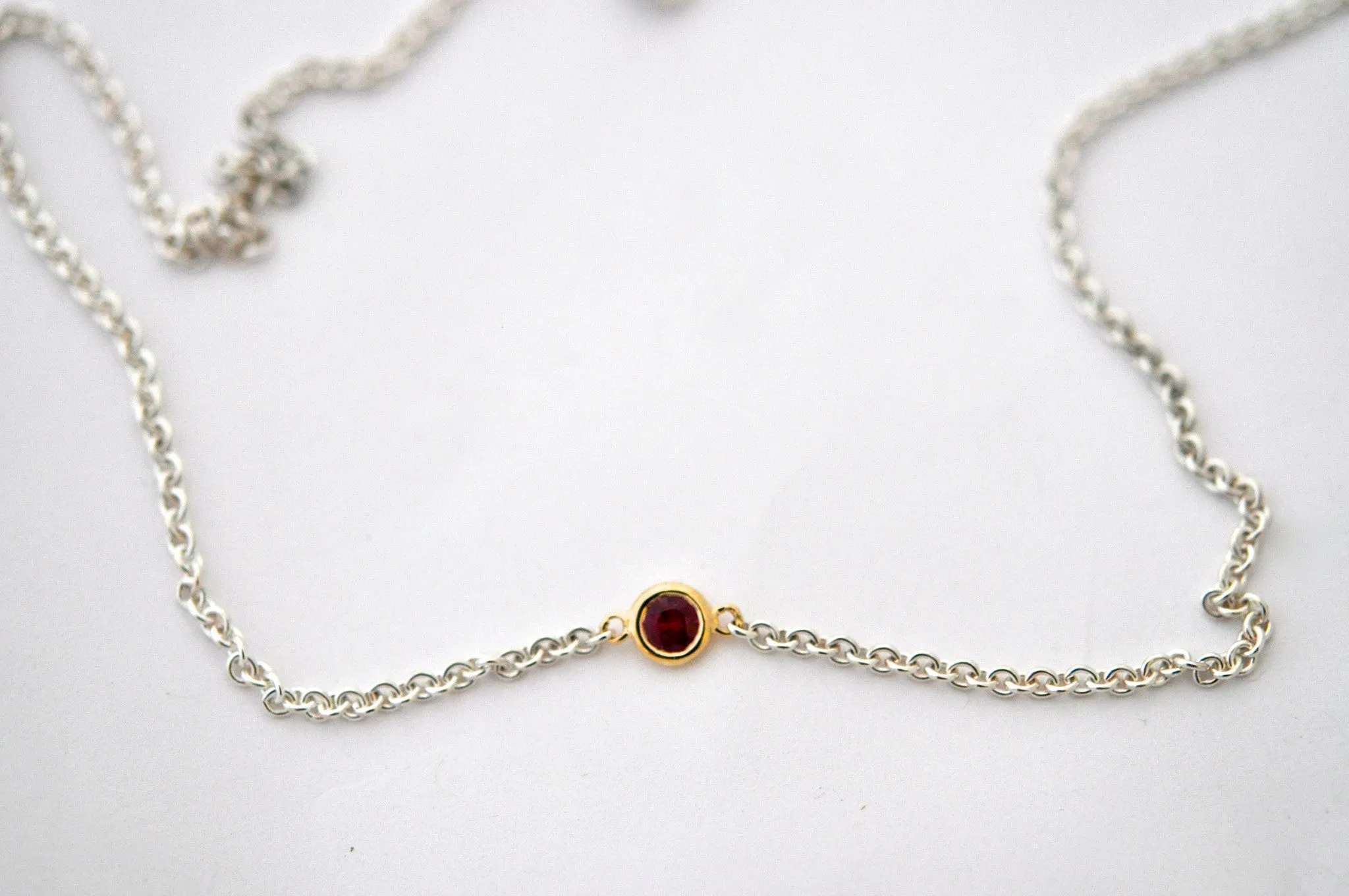 necklace / silver   small gemstone in gold bezel