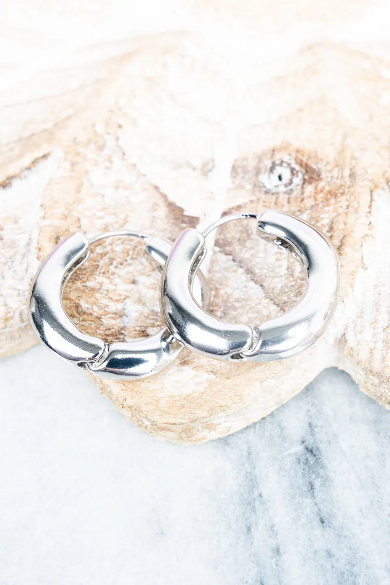 Rebecca Silvertone Huggie Hoop Earrings