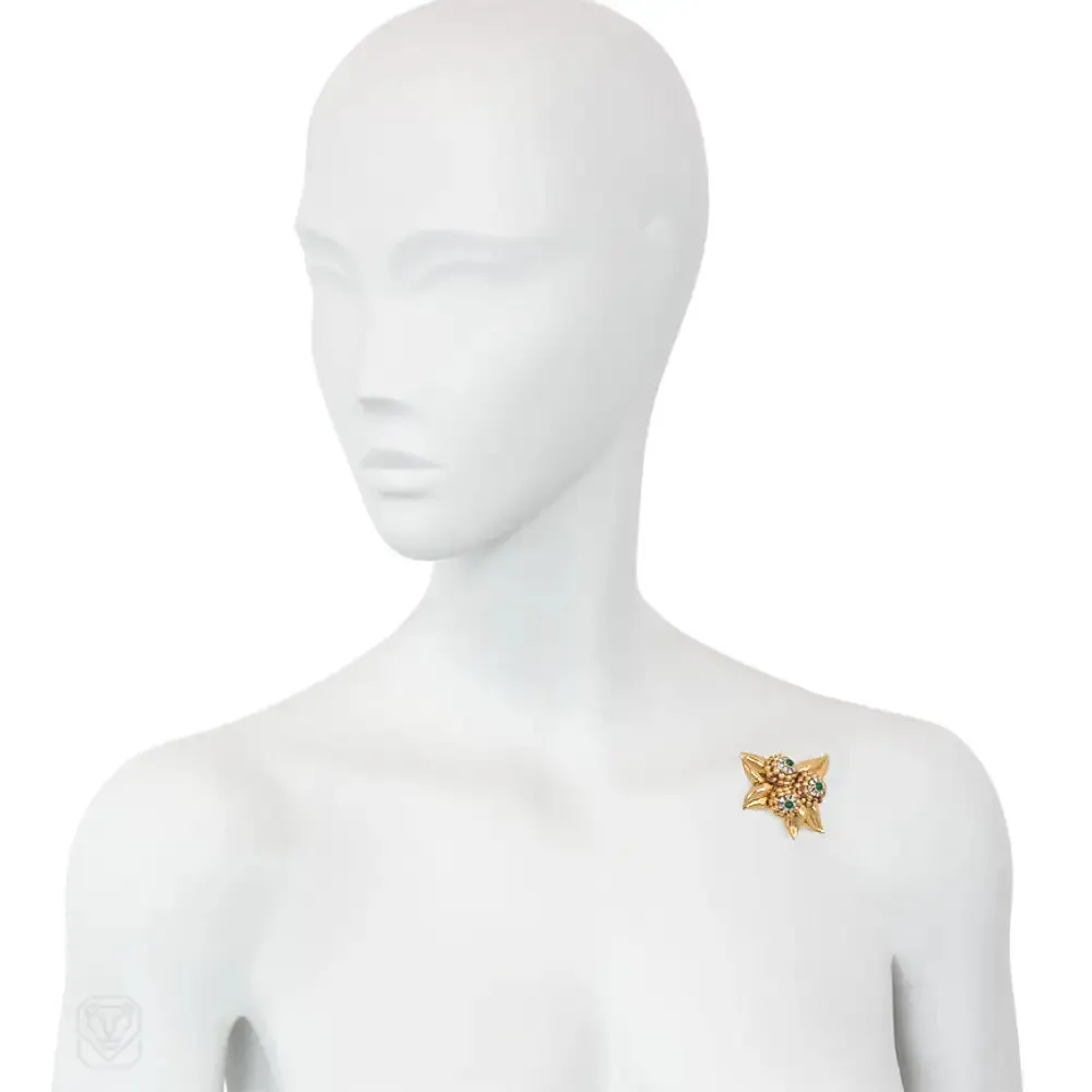Retro French gold, emerald, and diamond foliate motif brooch