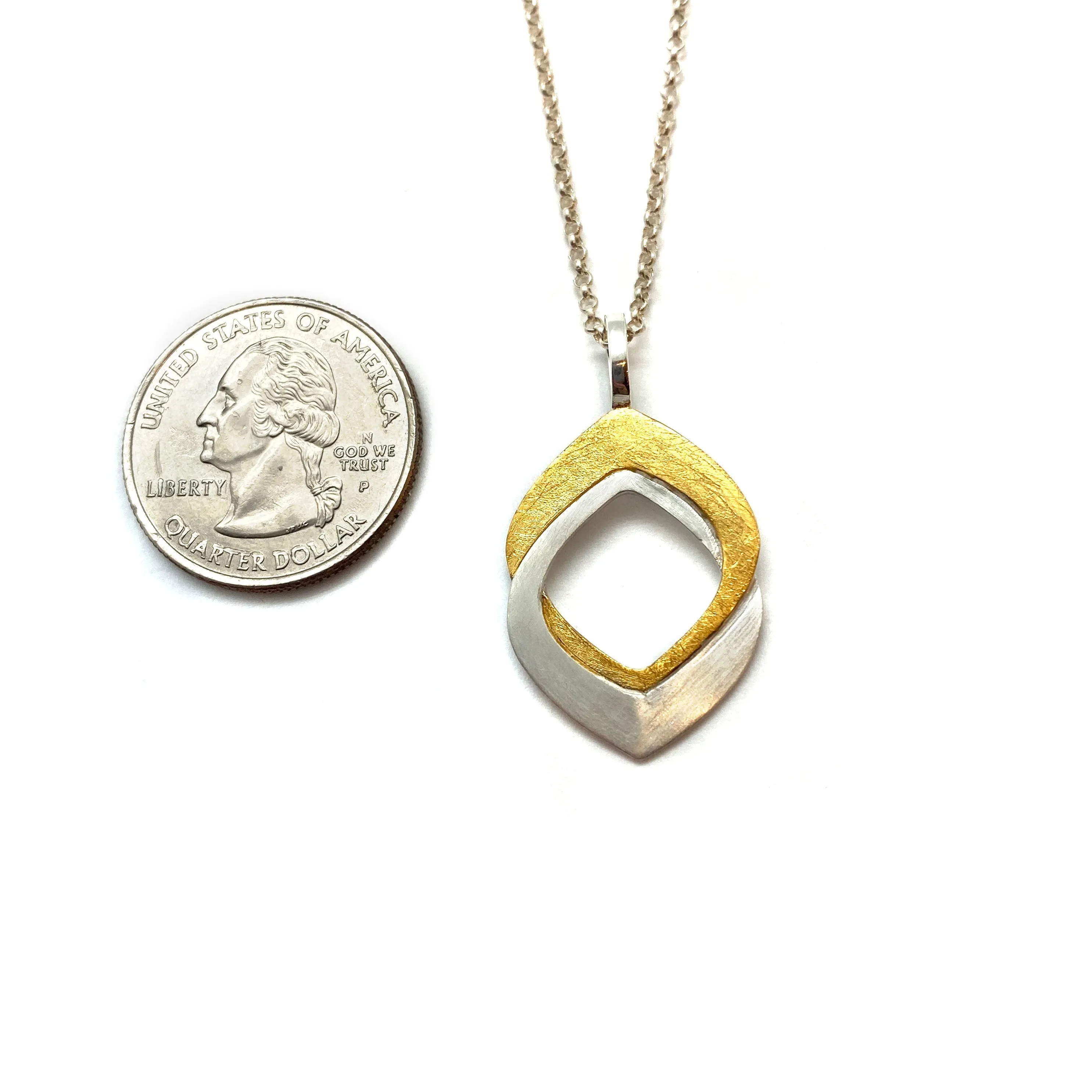Silver and Gold Intertwined Leaf Pendant