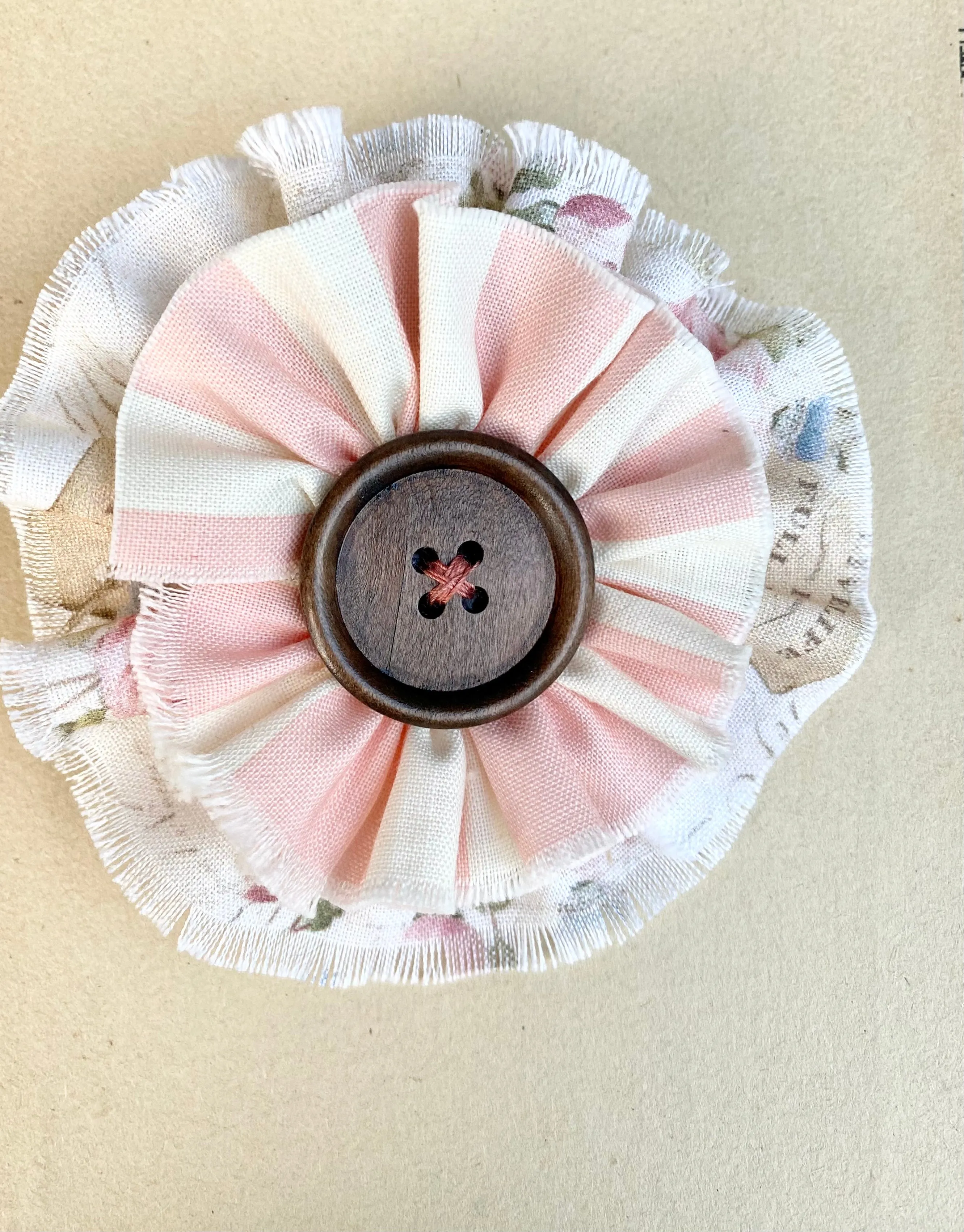 stripe and floral flower brooch.