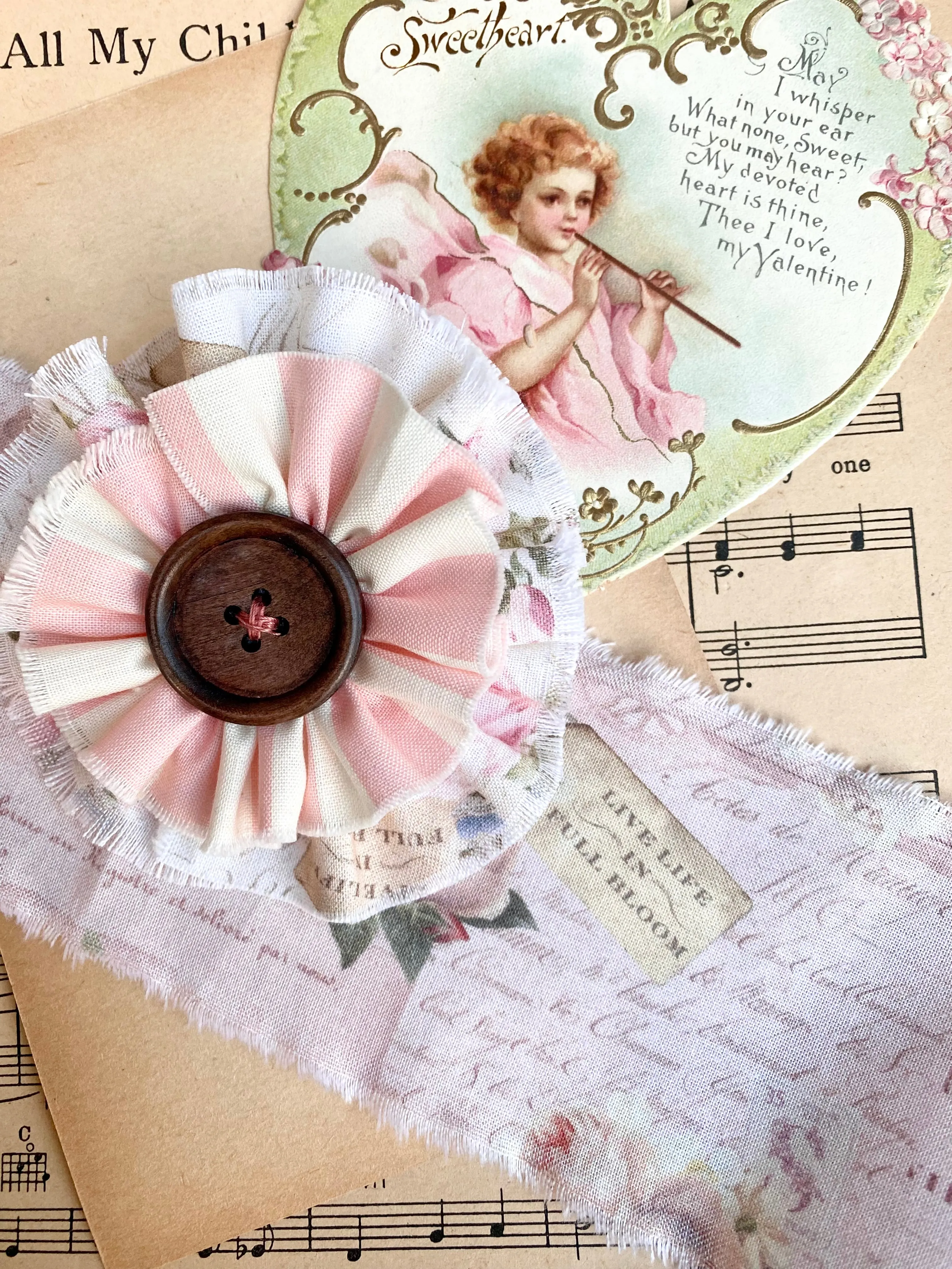 stripe and floral flower brooch.