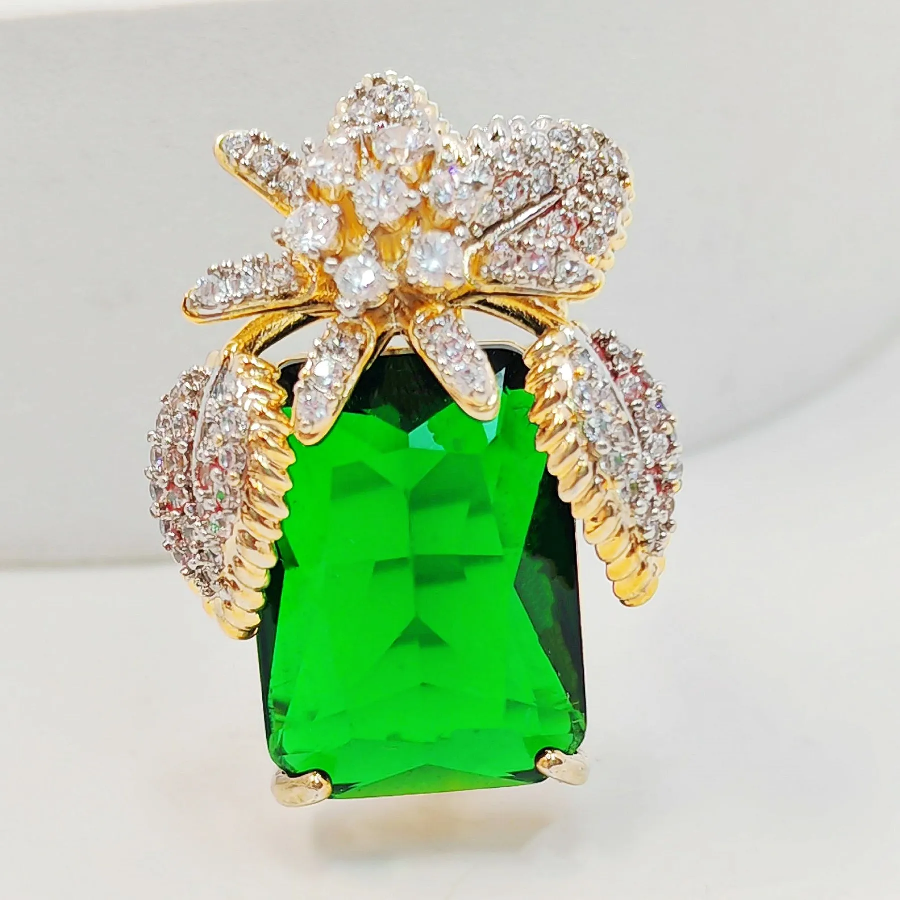 Vase-Shaped Brooch with Gold Tone Flower Design – Transparent Simulated Zircon Stamen and Green Square Center Stone – Elegant Square Pin for Women