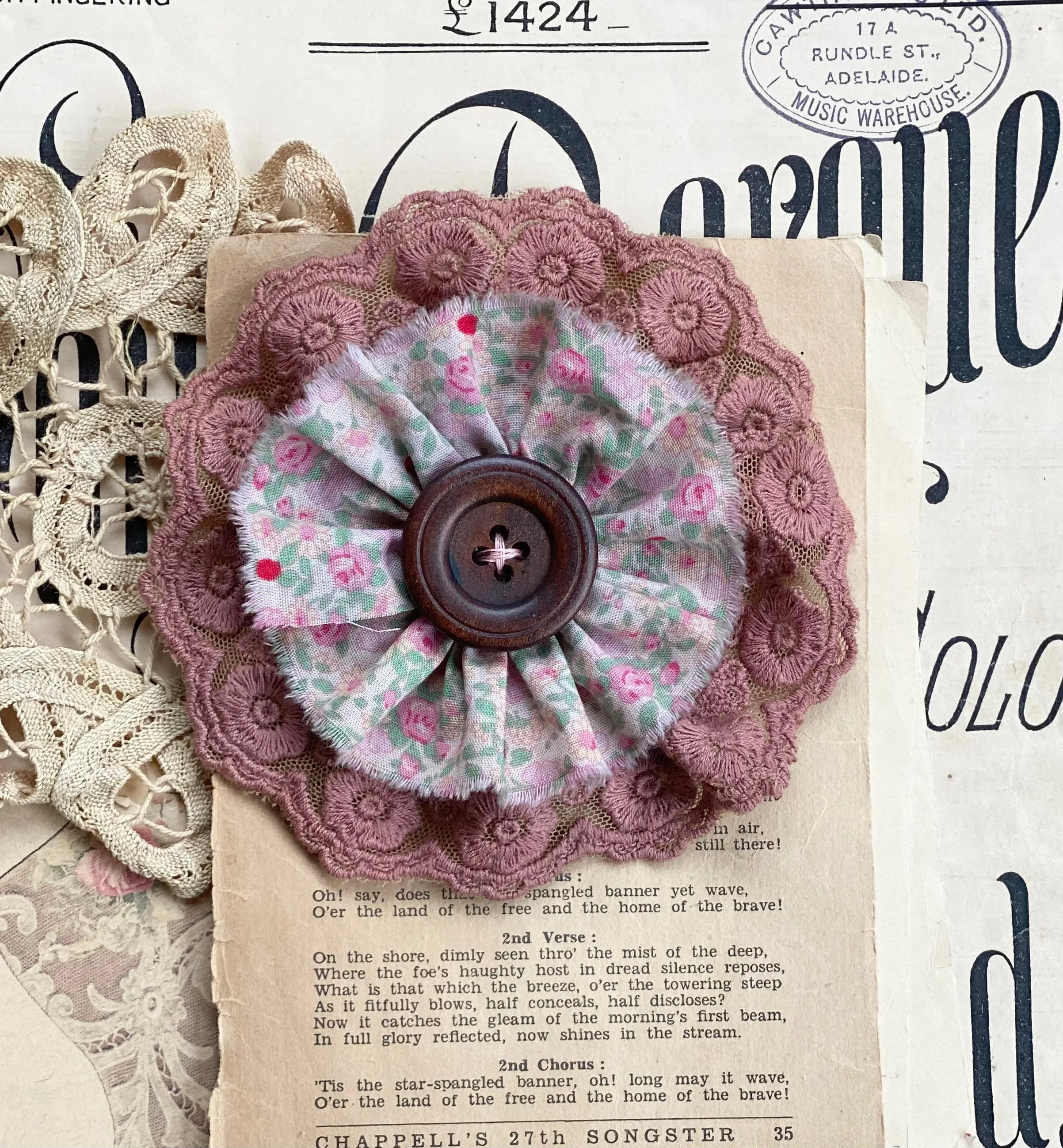 Vintage floral and lace brooch.