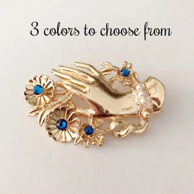 Vintage hand brooch with gem bouquet